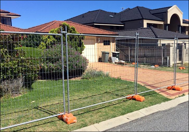 Temporary mesh fencing fixed with orange pp feet